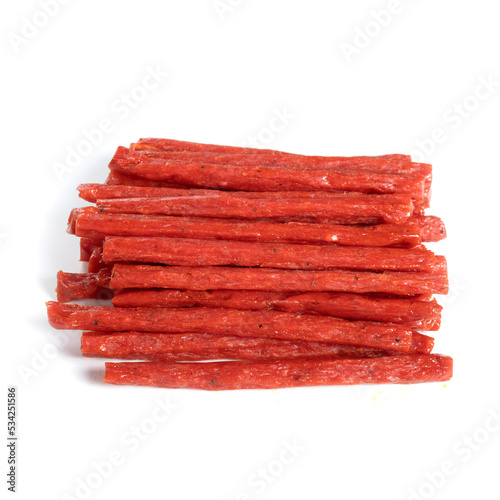 Cuadro en lienzo dried meat sticks isolated on white background.