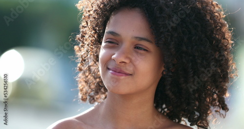 Beautiful preteen girl child portrait smiling outside  black African descent