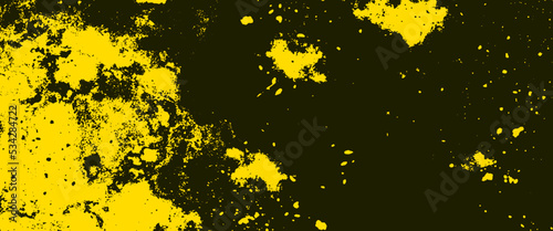 Golden Yellow Paint Splash on Black Background. Grunge rough texture or stone surface. Marble patterned texture splatter background. Crushed yellow macaroon. Tiny particles and black. 