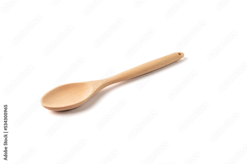 Eco-friendly wooden spoon made of wood on a white background. Eco-friendly wooden spoon made of wood on a white background.