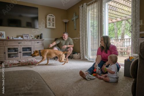 Marine veteran with service dog and family living life. © Scott Thompson