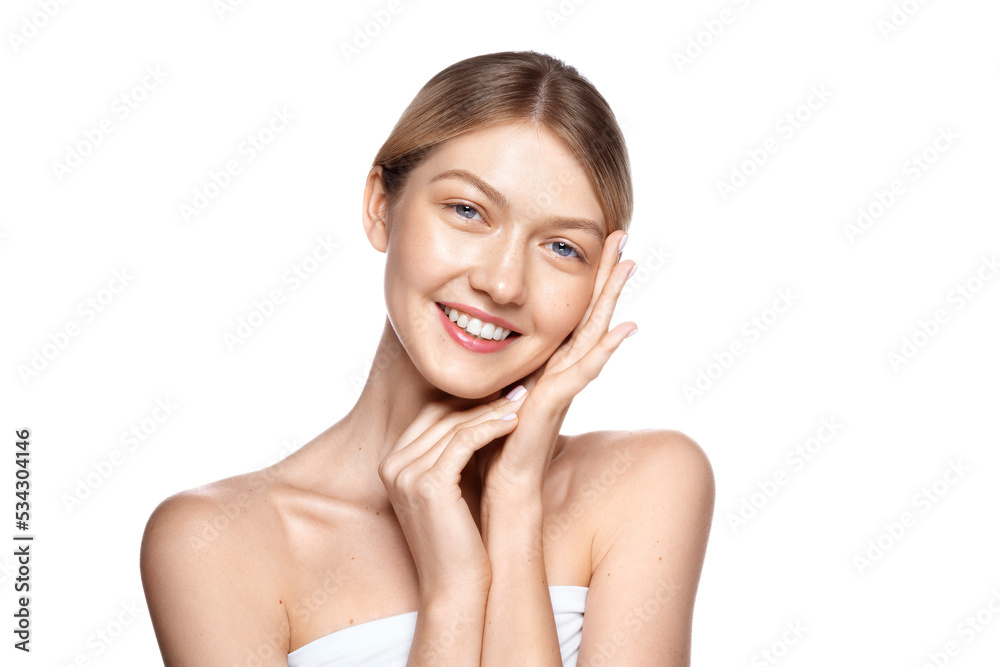 Skin hydration. Beauty portrait of young beautiful blonde woman with perfect hydrated skin is smiling and touching her face, isolated on white. Skin care concept Skin hydration. Beauty portrait of young beautiful blonde woman with perfect hydrated skin is smiling and touching her face, isolated on white. Skin care concept