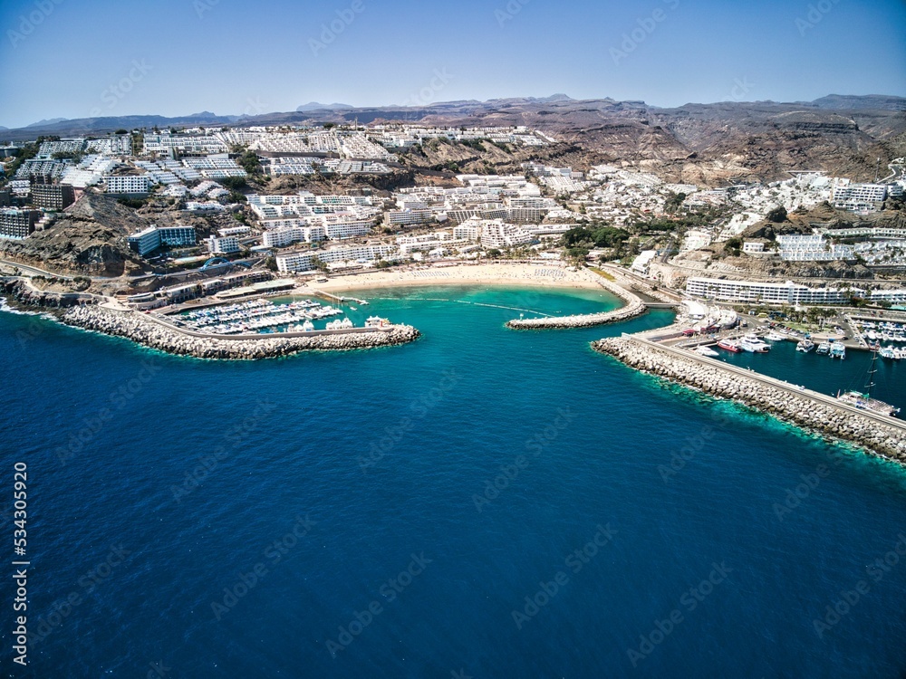 Fototapeta premium Aerial view of Puerto Rico de Gran Canaria beach