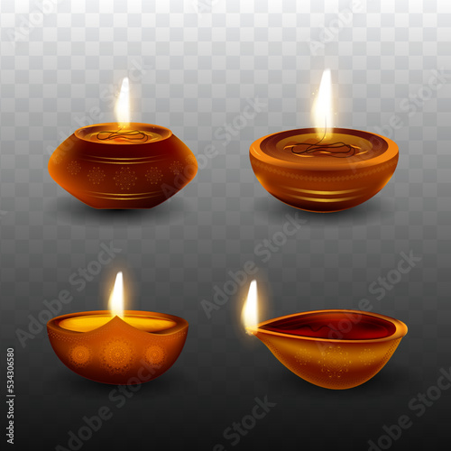 Set of four beautiful oil lamps (Diya). Happy Diwali.