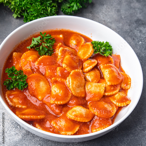 tomato ravioli fish stuffed pasta sauce fresh dish healthy meal food snack on the table copy space food background 