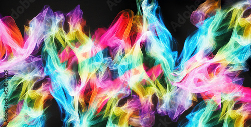 Light many colored smoke on black background as wallpaper header design © Nedrofly