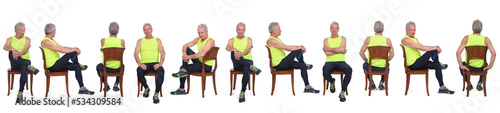 line of a group of same man with sportswear sitting on chair on white background