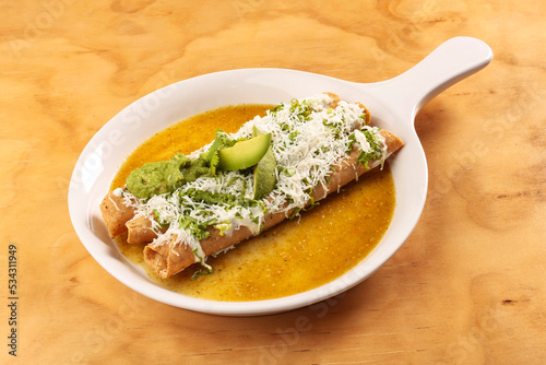 Tacos dorados, golden tacos or chicken flautas, typical Mexican food