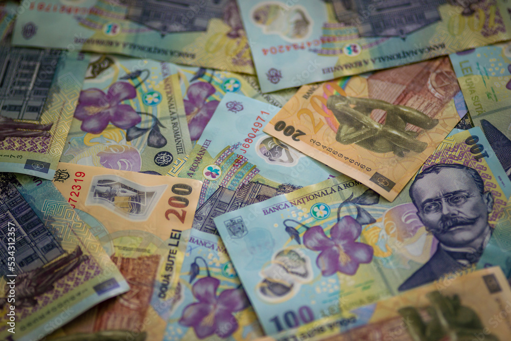 Obraz premium American cash, UK pound, Euro, ron lei romanian banknotes money dollar bills UK pound background financial concept cash close-up.