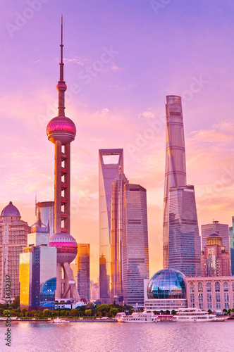 Photography View of the skyline along the riverside at sunrise in Shanghai, China