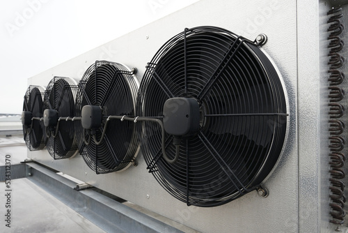 Obraz na płótnie Industrial condenser fans used in air conditioning, refrigeration, heat pump systems, modern eco green energy future concept w salonie