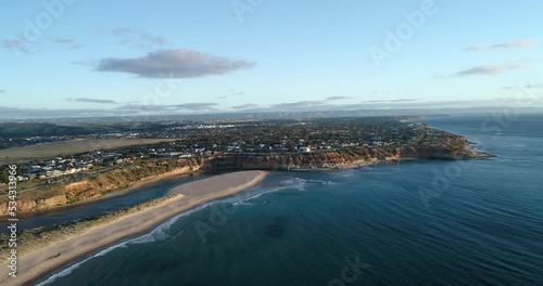 Wallpaper Mural Forward tracking aerial view of The Onkaparinga River and city of Port Noarlunga with wooden walkway leading to Noarlunga beach, Adelaide, South Australia,Australia Torontodigital.ca