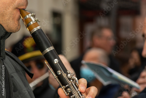 Musician From A Popular Band Playing Clarinet During A Religious Procession