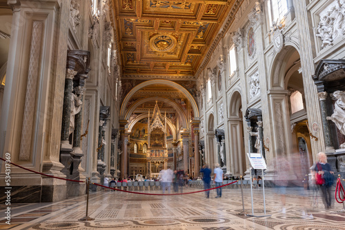 Long Exposition Shot of the Internal Side of the Basilic of Saint John in Laterano in Rome with Blurred people