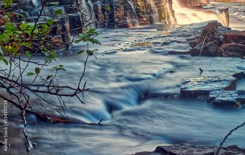 Fototapeta Naklejka Na Ścianę i Meble -  Water flowing like milk over the rocks - Trowbridge Falls, Thunder Bay, ON, Canada