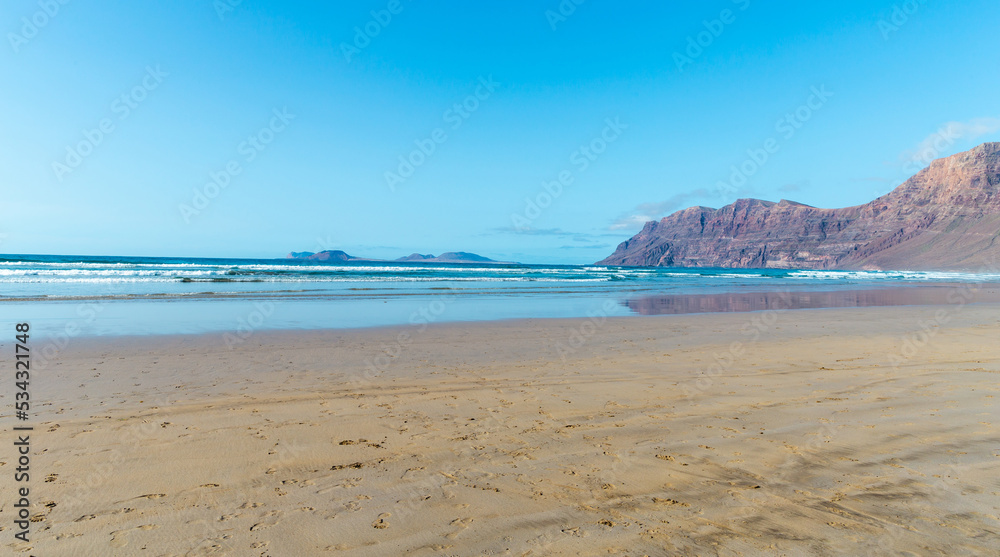 Beach view at Caleta de Famara, Lanzarote. Beach view at Caleta de Famara, Lanzarote.
