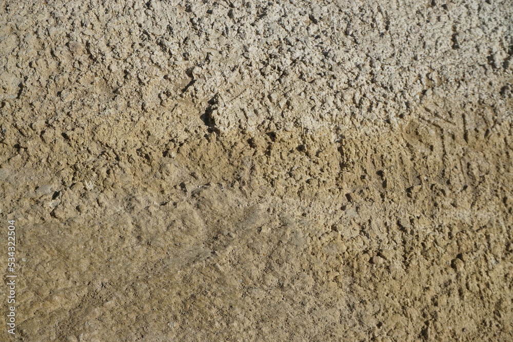 Braun-weißer Sand mit Muster Braun-weißer Sand mit Muster