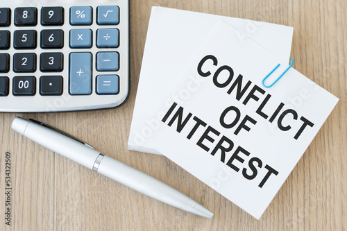 A card the Text conflict of interest. Business concept