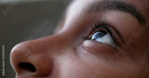 Child eyes looking up, black kid opening and closing eyes