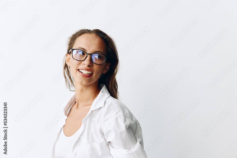 Woman portrait with tanned skin wearing eyeglasses on white background smiling Woman portrait with tanned skin wearing eyeglasses on white background smiling