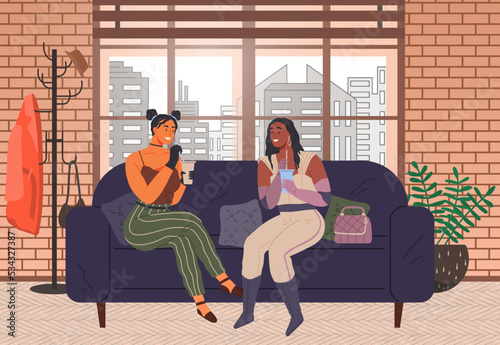 Girls sitting on sofa with paper cups. Glamour stylish female characters drink cocktails and communicating. Teen people during party with alcohol. Young women in costumes spending time together
