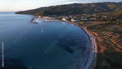 lever du jour sur la baie, le port et la ville de Macinaggio - Cap Corse photo
