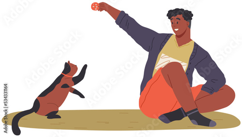 Pet owner plays with cat. Caring for animals, joint pastime with pets concept. Happy guy with kitty, domestic animal companion at home. Male character training kitten. Man spends time with cat