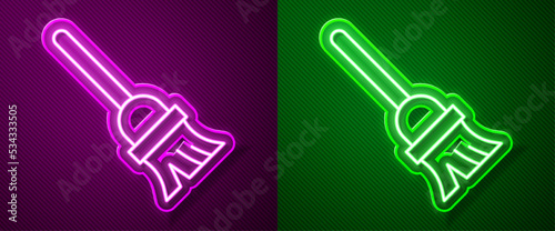 Glowing neon line Mop icon isolated on purple and green background. Cleaning service concept. Vector