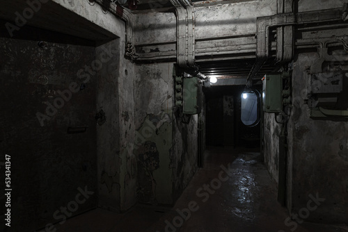Abstract dark military bunker interior, grungy underground