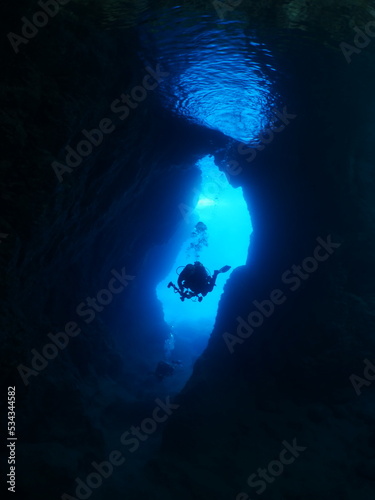sun beam and rays sun shine underwater in caves and caverns backgrounds scuba divers to explore