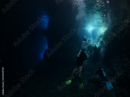 sun beam and rays sun shine underwater in caves and caverns backgrounds scuba divers to explore © underocean