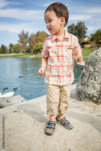 Young Chinese and Caucasian...
