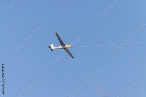 USA, Colorado, Boulder. Sailplane being towing into the sky.