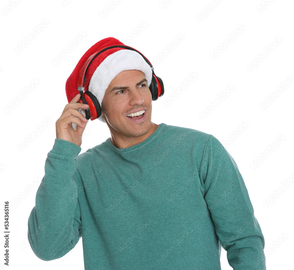 Happy man with headphones on white background. Christmas music Happy man with headphones on white background. Christmas music