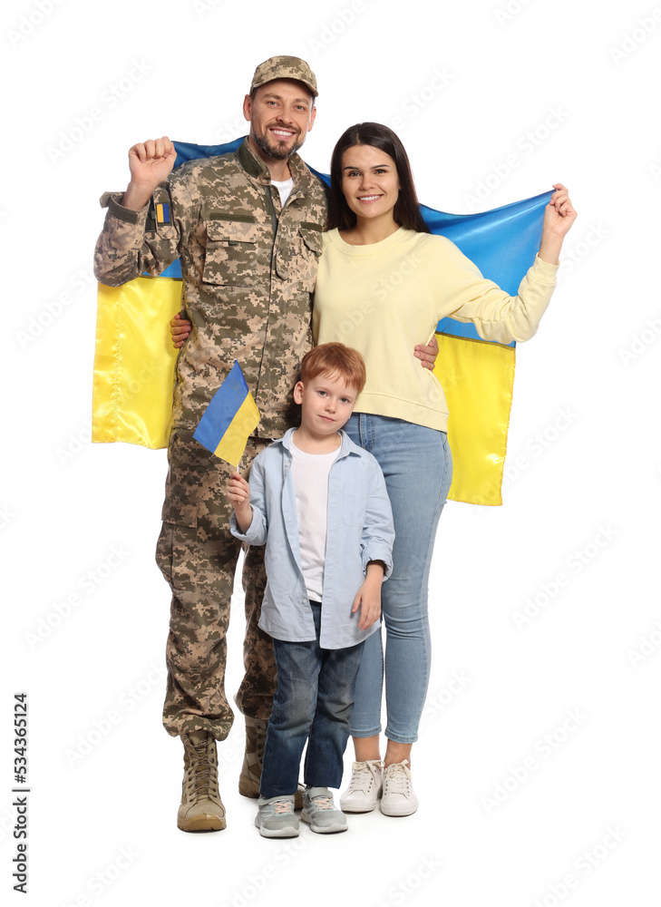Fototapeta premium Ukrainian defender in military uniform and his family with flags on white background