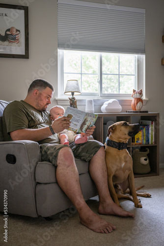 Marine veteran with service dog and family living life.