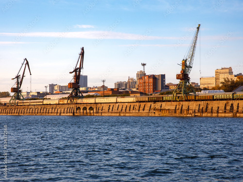 Port cranes on the Bank of the Ob river in Novosibirsk.