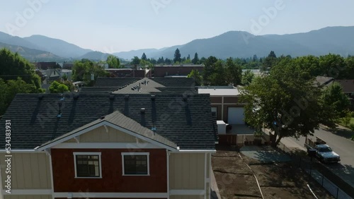 Wallpaper Mural Moving drone shot over a house in the city of Grants Pass, Oregon. Torontodigital.ca