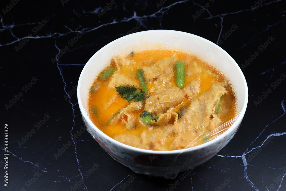 Plastic wrap over the food after reheated in microwave. Clear Plastic shrink is the necessary