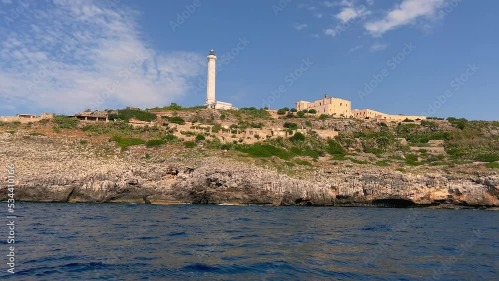 Low angle view of famous Santa Maria di Leuca lighthouse in Southern Italy seen from sailing tour boat Low angle view of famous Santa Maria di Leuca lighthouse in Southern Italy seen from sailing tour boat