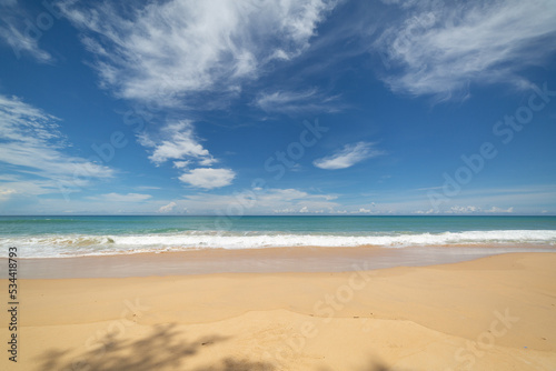 Fototapeta Naklejka Na Ścianę i Meble -  scenery white cloud in blue sky above long white beach..beautiful nature on the beach..smooth waves from green sea background.
