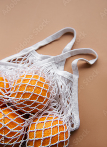 Eco-friendly bag with ripe oranges