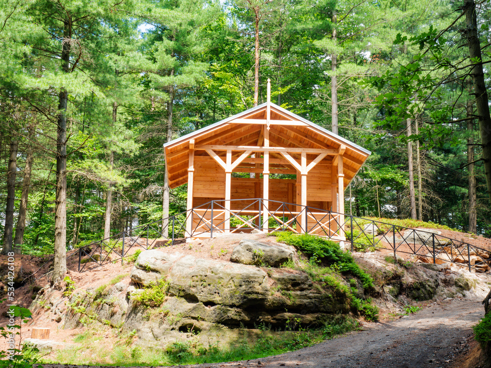 Morning sun shinning on the picnic and tourists shelter in popular park Morning sun shinning on the picnic and tourists shelter in popular park