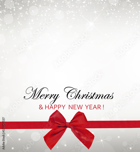 Shiny red satin ribbon Decorative red bow with a horizontal red ribbon for page decor.Christmas and holiday background