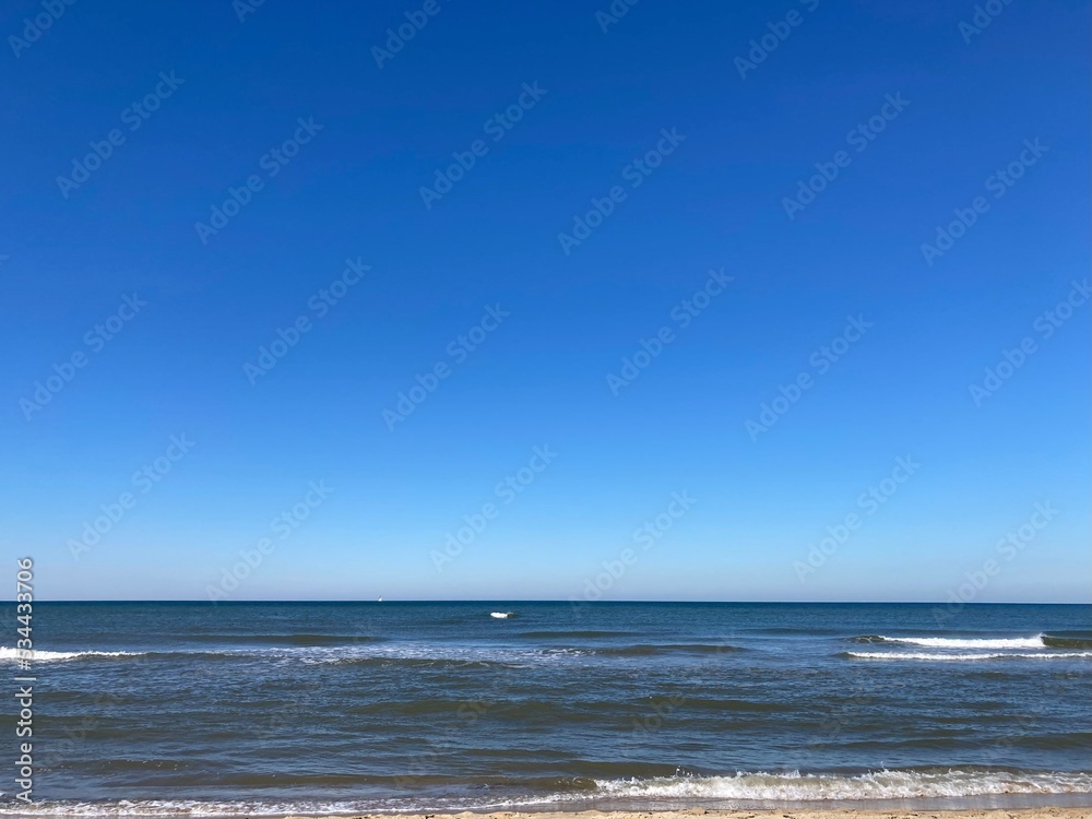 the calm sea with blue sky 