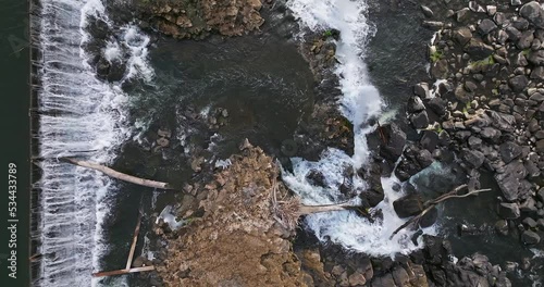 Willamette Falls Oregon City Oregon.   It is the largest waterfall in the Northwestern United States by volume, and the seventeenth widest in the world.  Horseshoe in shape, it is 1,500 feet wide.