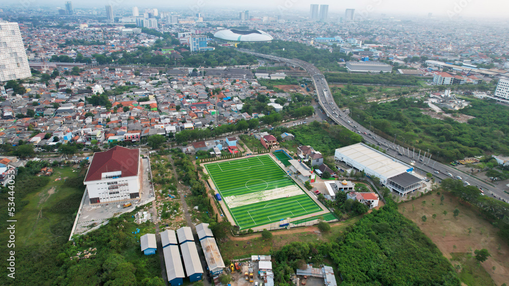 Aerial View of The largest stadium of Bekasi from drone and noise cloud. Aerial View of The largest stadium of Bekasi from drone and noise cloud.