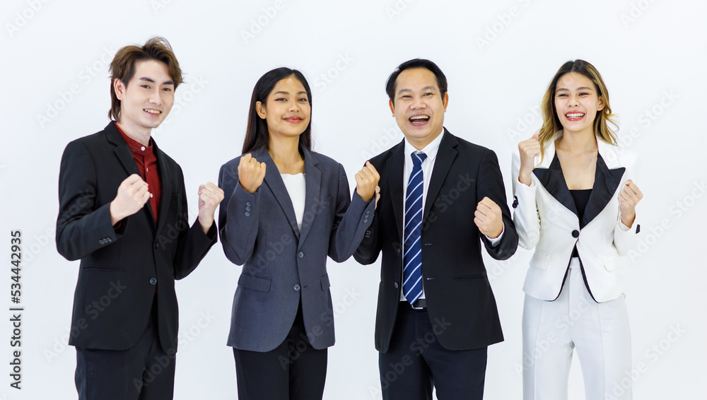 Studio shot Millennial Asian cheerful successful professional male businessmen and female businesswomen in formal suit standing posing side by side smiling together on white background Studio shot Millennial Asian cheerful successful professional male businessmen and female businesswomen in formal suit standing posing side by side smiling together on white background