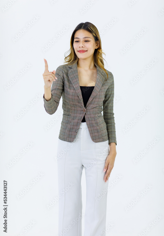 Isolated cutout studio shot of Millennial Asian successful professional female businesswoman in formal suit standing smiling holding hand pointing finger on blank empty space on white background Isolated cutout studio shot of Millennial Asian successful professional female businesswoman in formal suit standing smiling holding hand pointing finger on blank empty space on white background