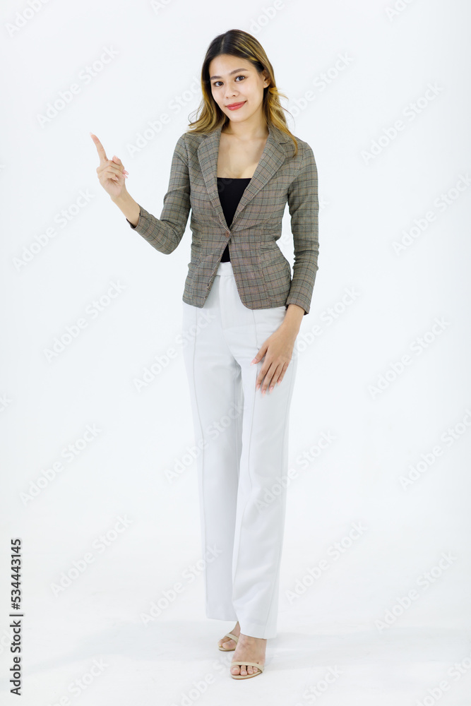 Isolated cutout studio full body shot Millennial Asian successful professional female businesswoman in formal suit standing smiling posing crossed arms on blank empty space on white background Isolated cutout studio full body shot Millennial Asian successful professional female businesswoman in formal suit standing smiling posing crossed arms on blank empty space on white background